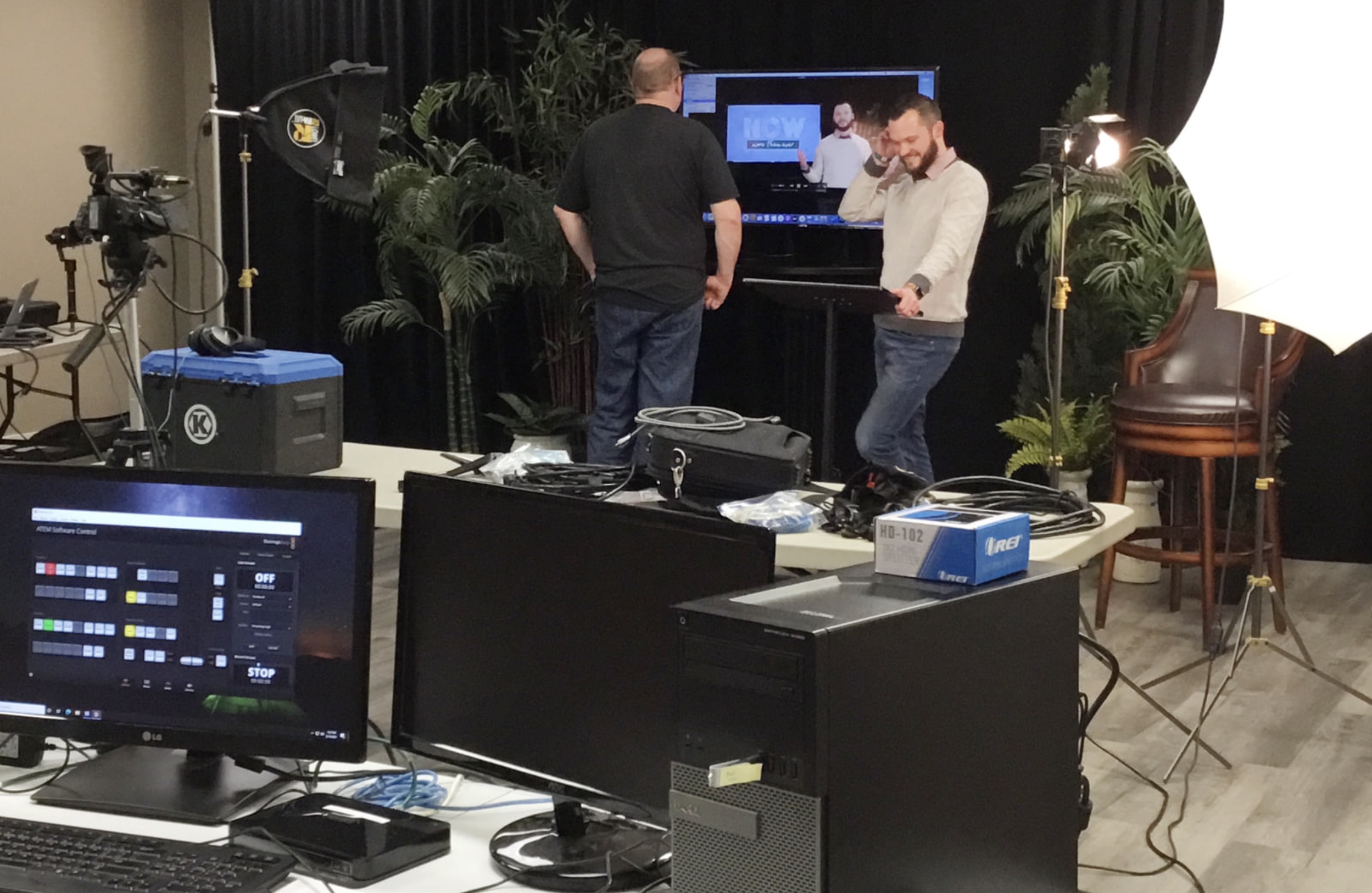 Stylus Technologies crew running a corporate video production with camera, lighting and switcher